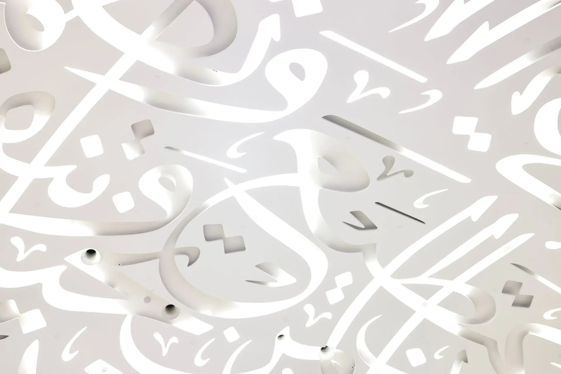 Bilingual medical equipment catalogue shown across English and Arabic layouts